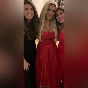 red sparkly formal dress with cross cross back